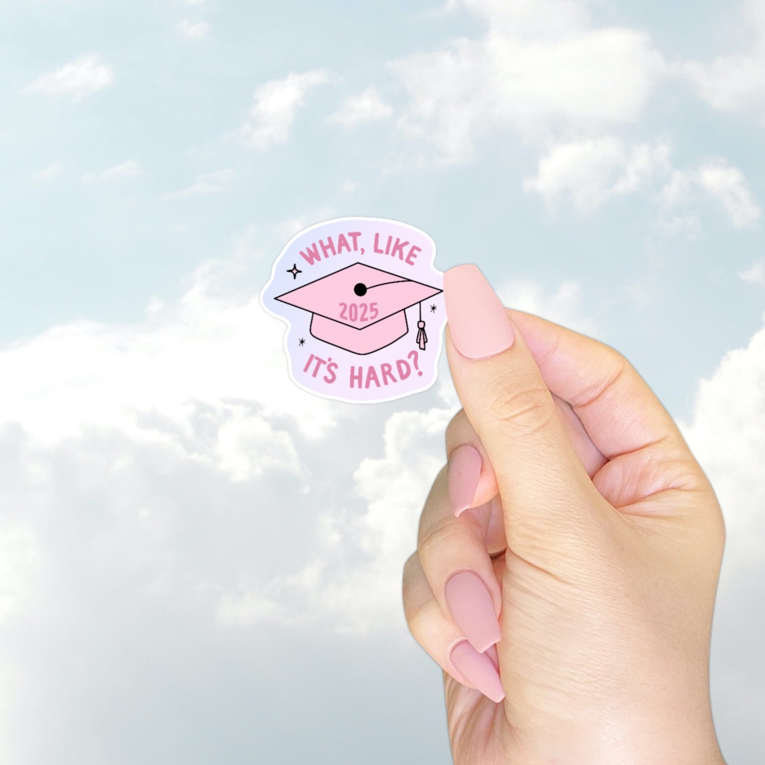 A pastel pink and purple sticker with a pink graduation cap and the words “What, like it’s hard?” surrounding “2025” in the center. A sassy graduation sticker perfect for the Elle Woods of the class.
