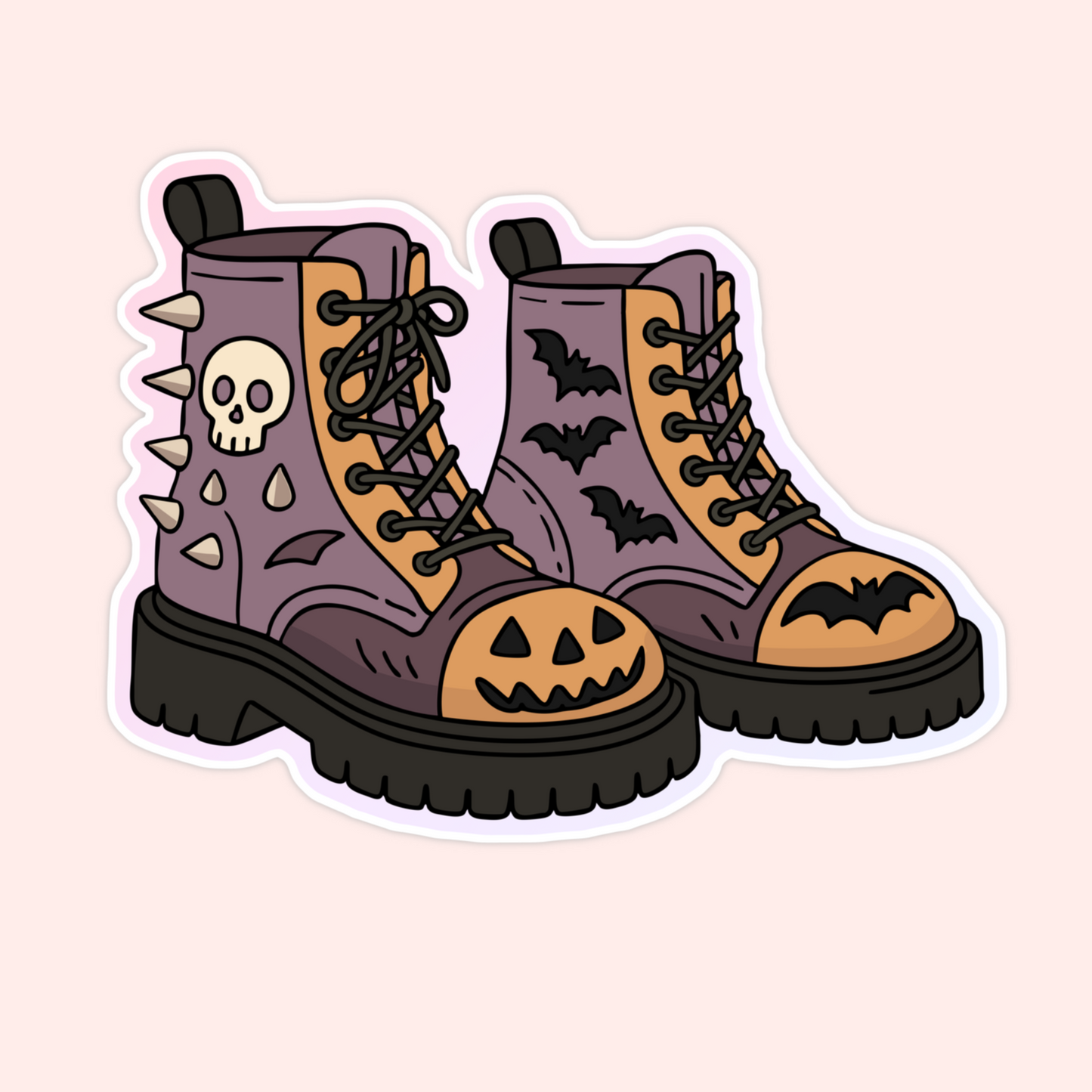 Sticker of purple combat boots decorated with bats, skulls, spikes, and jack-o’-lantern faces.