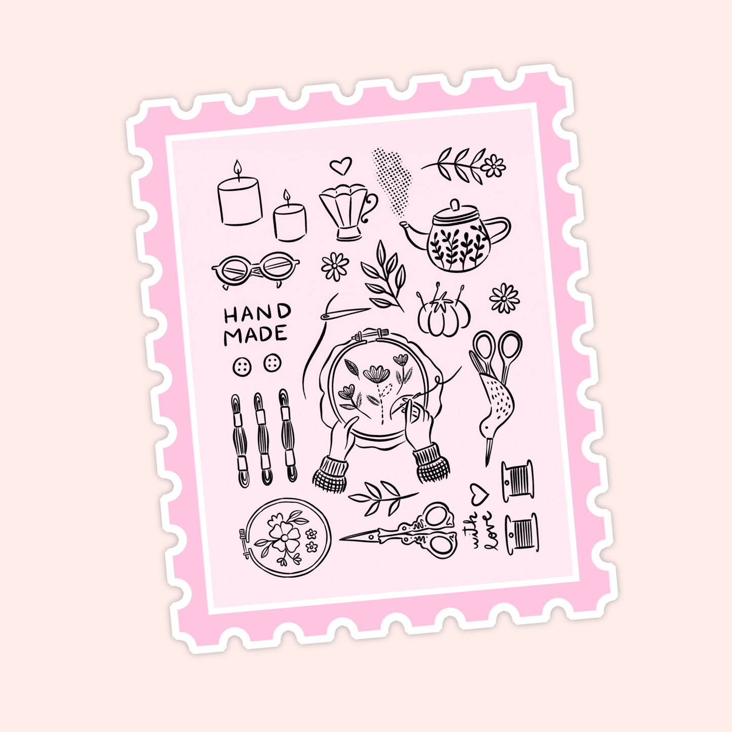 Pink postage stamp style sticker with black line art of embroidery supplies, candles, teapot, florals, scissors, thread, and the word handmade.