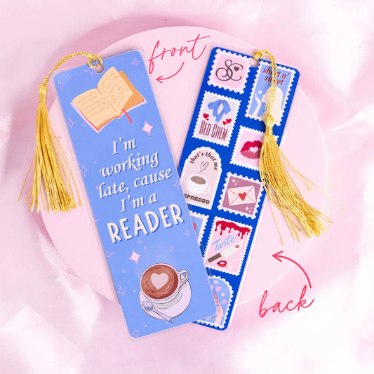 โSabrina Carpenter-inspired blue bookmark with coffee and open book illustrations โ features the quote โIโm working late cause Iโm a reader,โ perfect for pop girlies and book lovers.โ