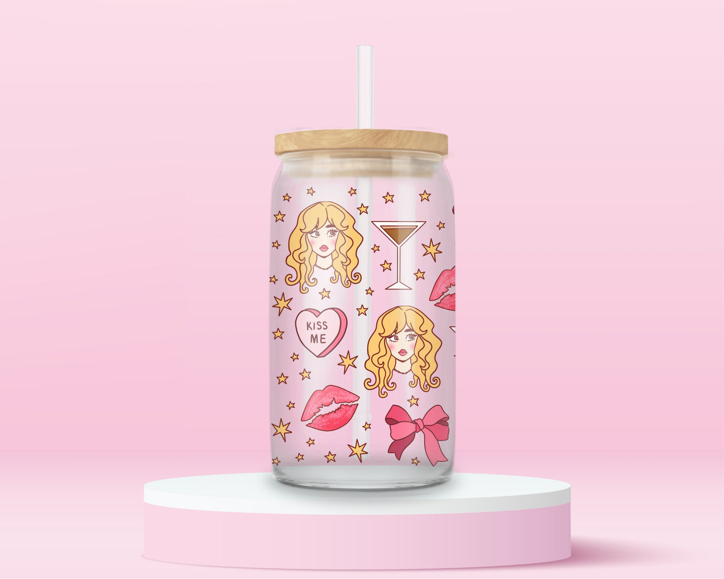 A girly pink glass cup featuring a blonde glam girl, pink bows, martinis, lipstick kisses, stars, and “kiss me” hearts — Sabrina Carpenter vibes all the way.