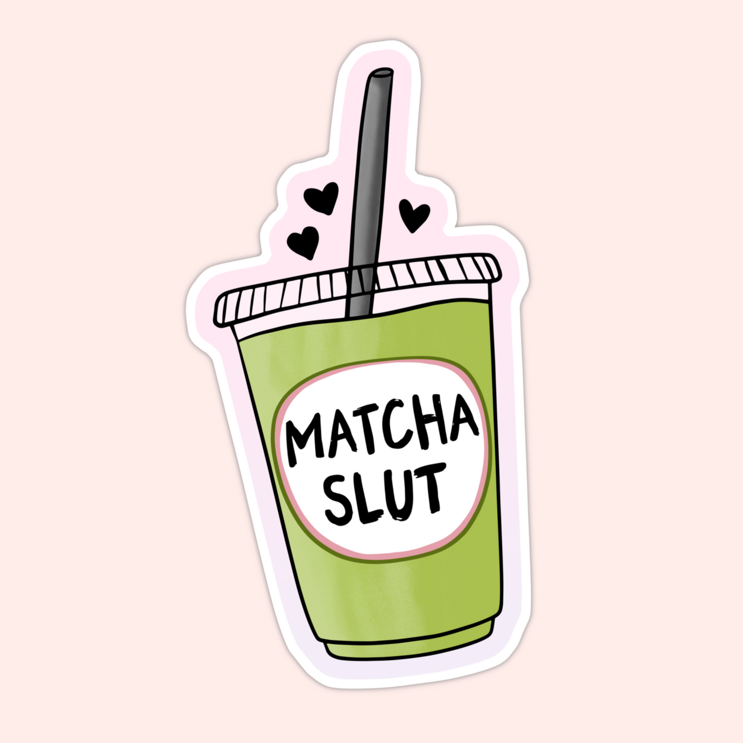 Green matcha drink cup with a straw and hearts displaying the phrase “matcha slut” in bold black text.