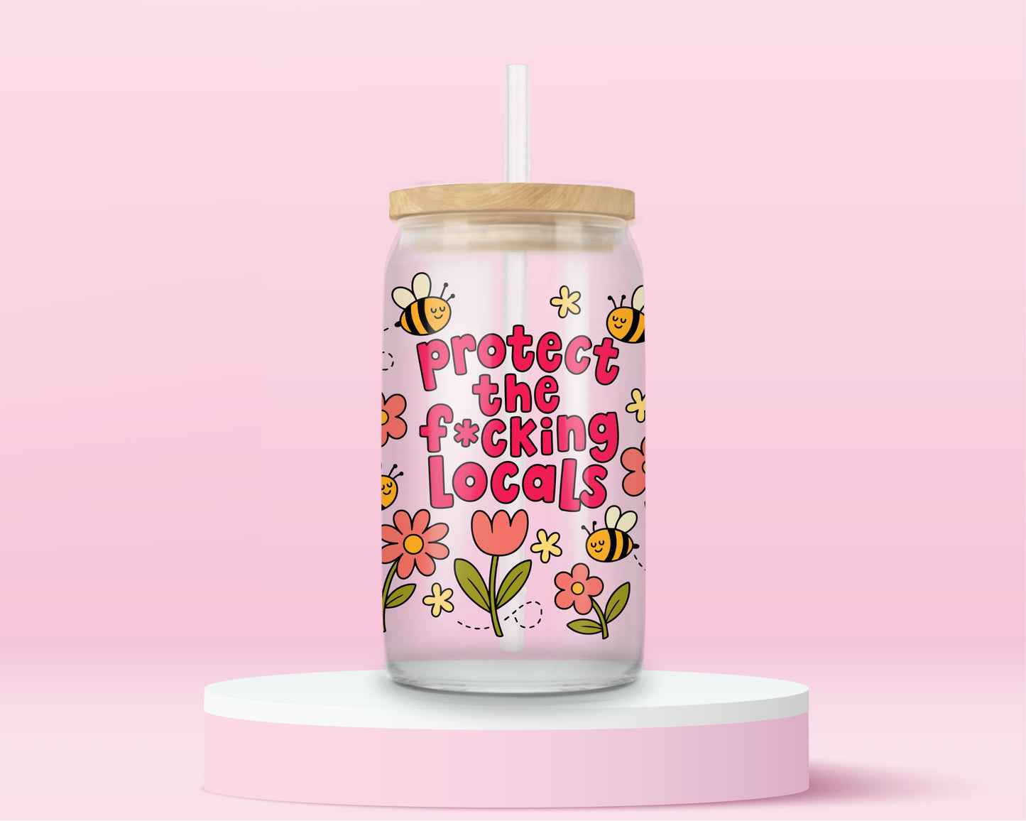 Glass can tumbler with bamboo lid and glass straw featuring flowers, bees, and bold pink text that says Protect The F*cking Locals on a pink background.