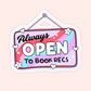Hanging sign style sticker with rainbow background and text that reads “Always Open To Book Recs.”