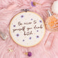 Hand embroidered quote hoop reading be nicer to yourself you dumb bitch styled on pink faux fur with crystals and perfume bottle
