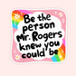 Rainbow and flower-themed vinyl sticker with the phrase “Be the person Mr. Rogers knew you could be” in bold black lettering.