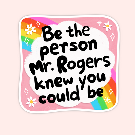 Rainbow and flower-themed vinyl sticker with the phrase “Be the person Mr. Rogers knew you could be” in bold black lettering.