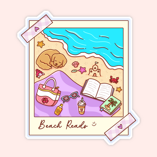 Cute beach reads sticker with a beach photo frame, open book, sunglasses, beach bag, iced drink, sunscreen, seashells, and ocean view.