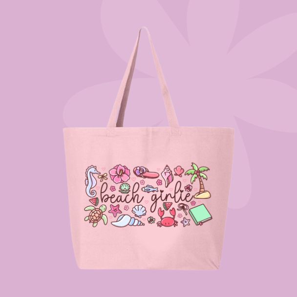 Large pink canvas tote bag featuring the words beach girlie surrounded by seashells, hibiscus flowers, palm trees, sea creatures, watermelon, and coastal doodles.