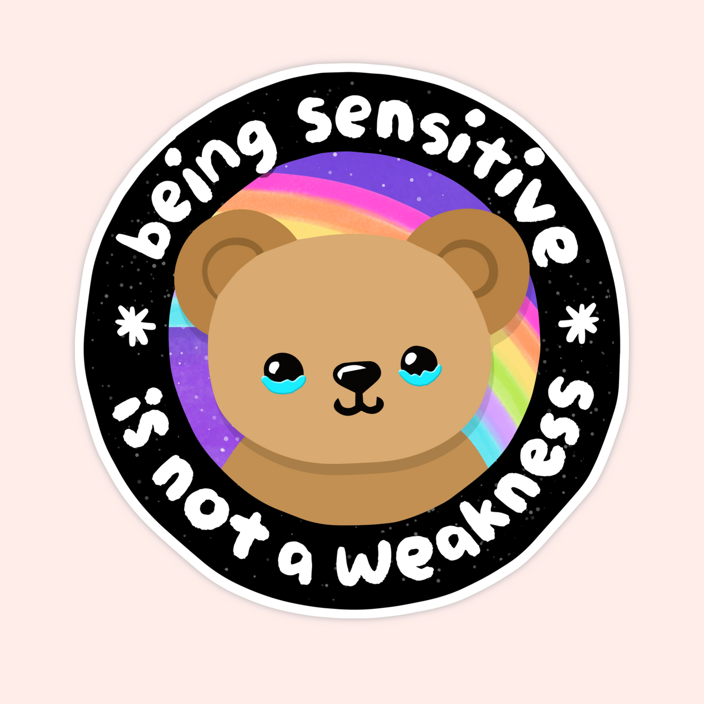 Round vinyl sticker featuring a teddy bear with a rainbow background and the phrase “Being Sensitive Is Not a Weakness.”