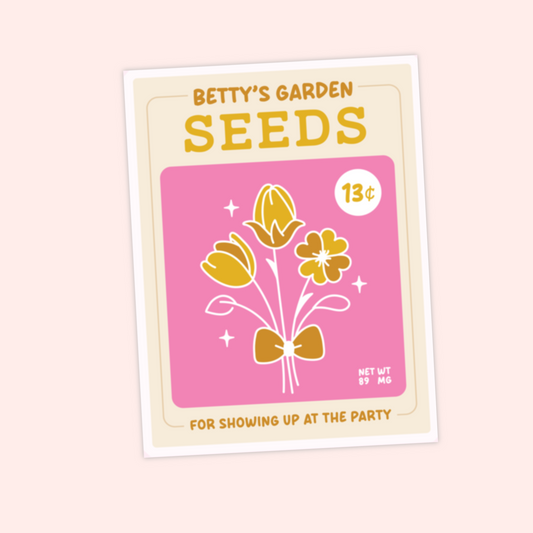 A pink vintage-style seed packet labeled “Betty’s Garden Seeds.” It shows golden flowers with a bow and reads “for showing up at the party.”