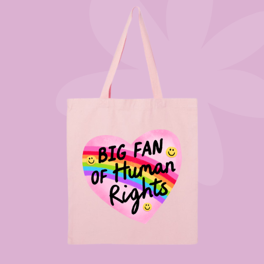 Human rights themed tote bag with rainbow heart graphic and text reading big fan of human rights.