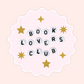 Pink notebook background sticker with white letter beads spelling “Book Lovers Club” and gold star accents.