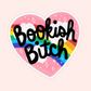 Pink heart sticker with rainbow and bold black lettering that reads “Bookish Bitch.”