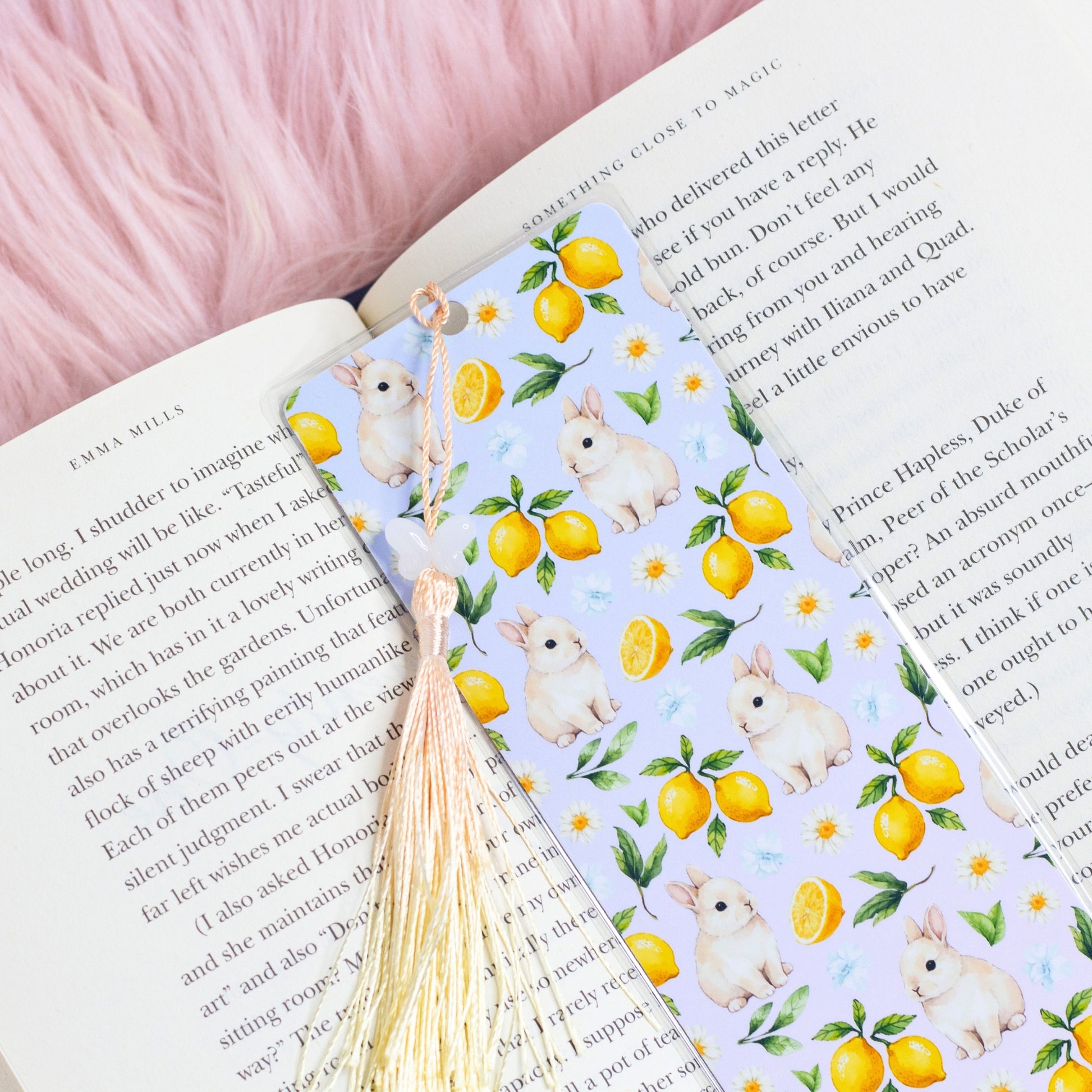 cute bunny lemon bookmark with rabbits and lemons placed inside an open book