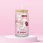 Glass tumbler with book stack and Dr Pepper design with the phrase all I need is books and a Dr Pepper.