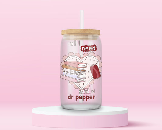Glass tumbler with book stack and Dr Pepper design with the phrase all I need is books and a Dr Pepper.