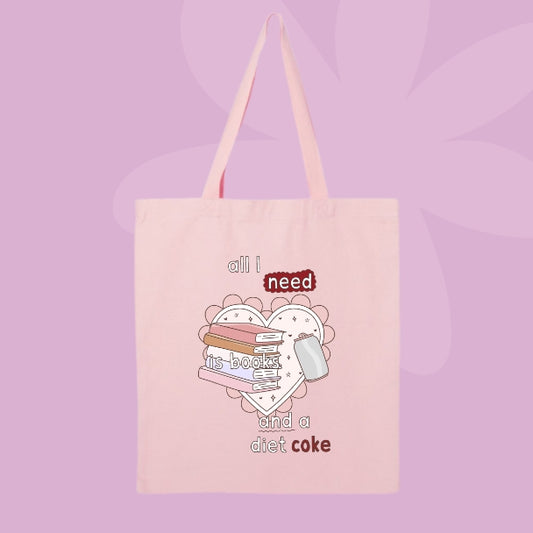 Canvas tote bag with book stack graphic and phrase all I need is books and a diet coke.