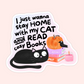 Sticker with a black cat, pumpkin, crow, books, candle, and text that says “I just wanna stay home with my cat and read cozy books.”