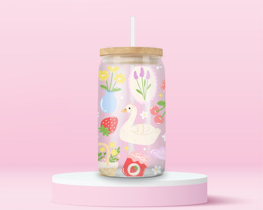Cottagecore themed glass can tumbler with swan, strawberries, flowers, jam jar, and whimsical picnic illustrations.