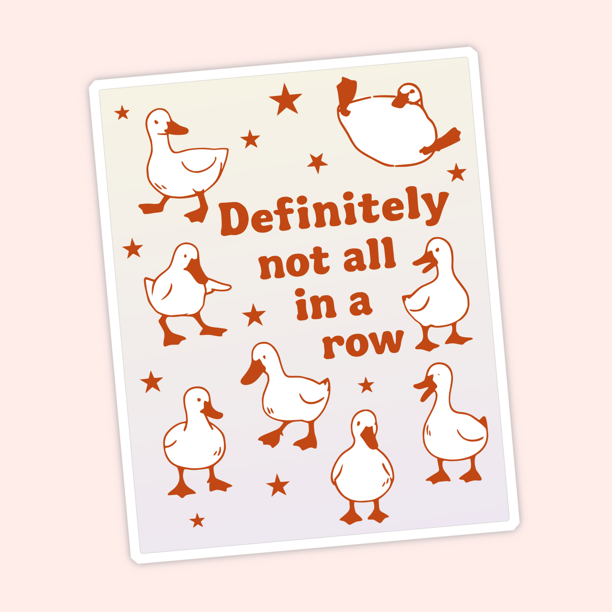 Cream and rust colored sticker featuring multiple ducks and stars with the phrase “Definitely not all in a row.”