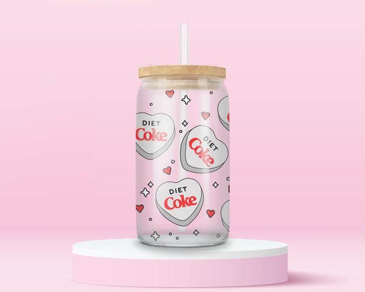 glass tumbler with bamboo lid and straw featuring heart-shaped “Diet Coke” logos surrounded by stars and hearts.
