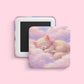 Sleeping kitten magnet on pastel clouds with dreamy soft aesthetic