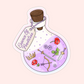 Lavender fantasy potion bottle filled with magical icons like crowns, swords, flowers, and arrows, labeled “Essence of Powerless.”