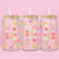 “Aesthetic iced coffee cup with pastel floral design – cute glass tumbler for spring and summer vibes.”
