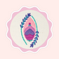 Sticker of original embroidery art featuring a floral yoni-inspired design with pink, purple, teal, and botanical details.