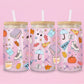 glass tumbler with illustrations of Luke’s coffee cup, “I Smell Snow,” ice skates, books, yarn, pumpkins, and fairy lights.