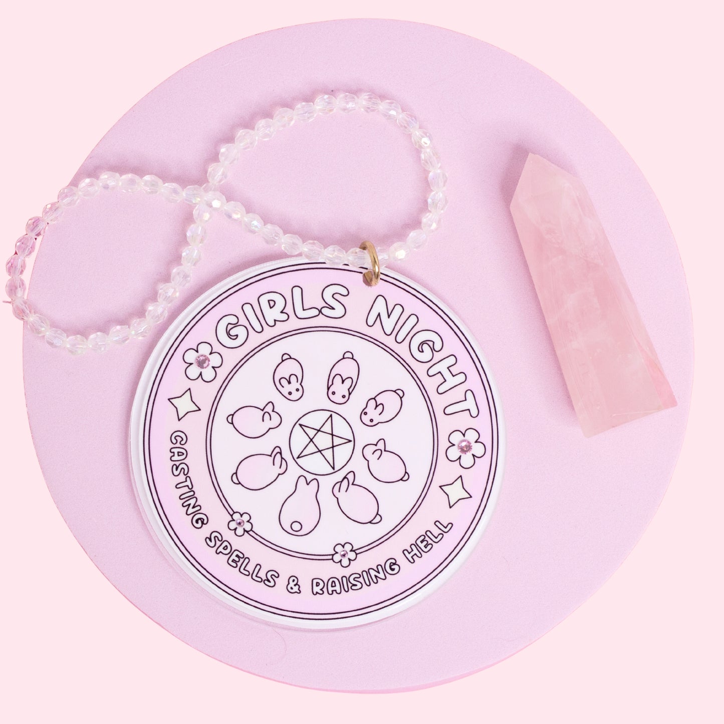 witchy acrylic car charm with bunny familiars, pentagram design, and clear crystal beaded hanger