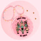 Girls Will Be Girls car charm featuring a pink witchy girl gang design with gold stars, sparkly details, and a pastel beaded hanger.