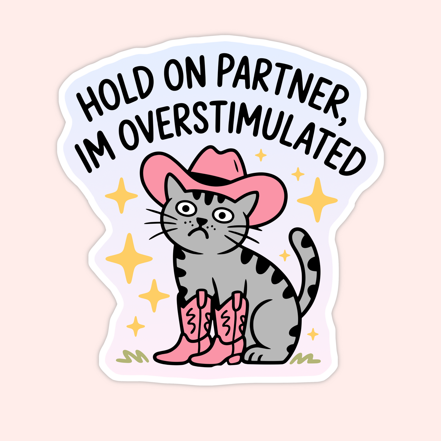 Funny vinyl sticker featuring a gray tabby cat wearing a pink cowboy hat and boots with the phrase “Hold On Partner, I’m Overstimulated.”