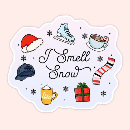 A cozy winter-inspired vinyl sticker featuring the iconic “I Smell Snow” phrase with festive winter icons. Perfect for laptops, water bottles, and Gilmore Girls–inspired vibes.