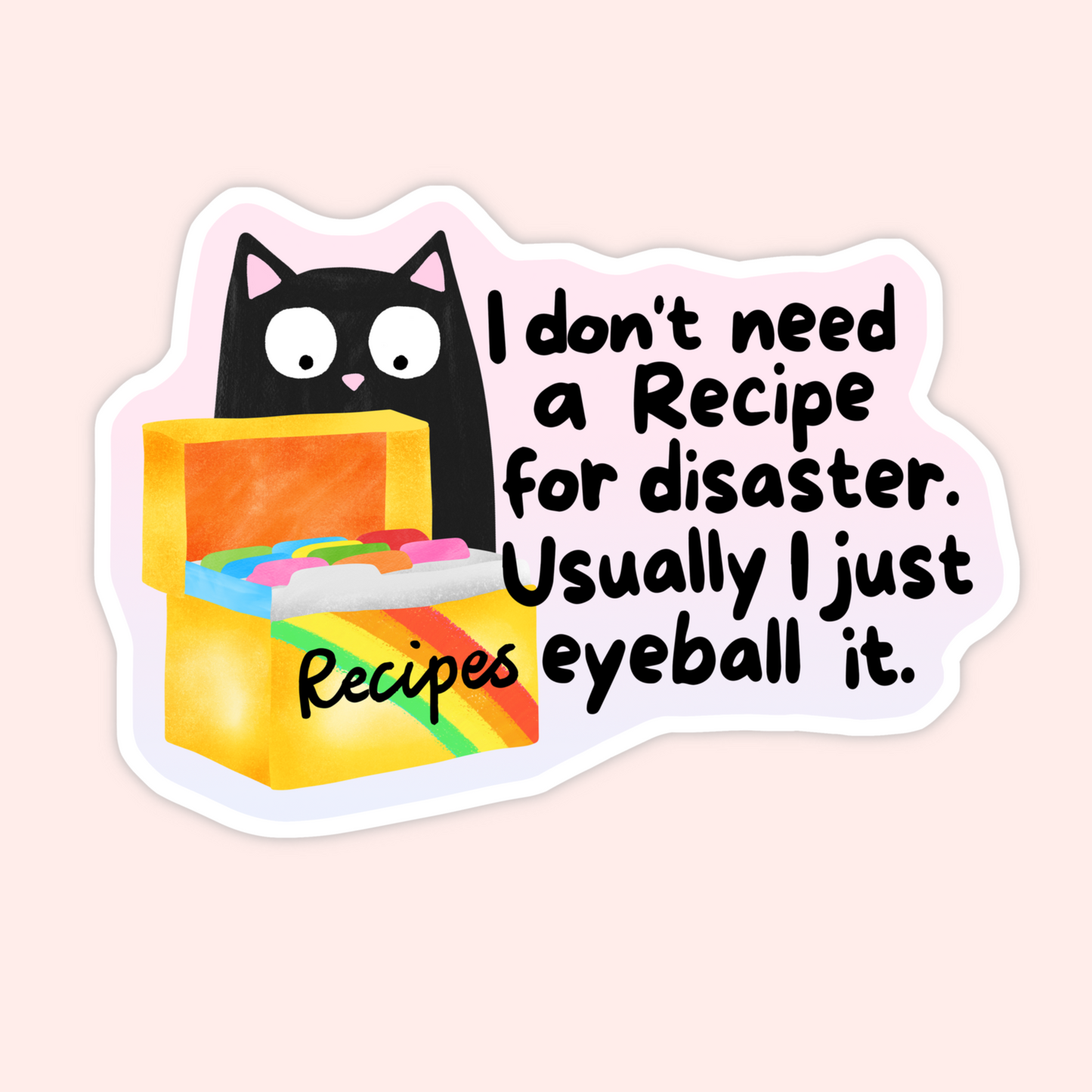Black cat beside rainbow recipe box with text that reads “I don’t need a recipe for disaster. Usually I just eyeball it.”