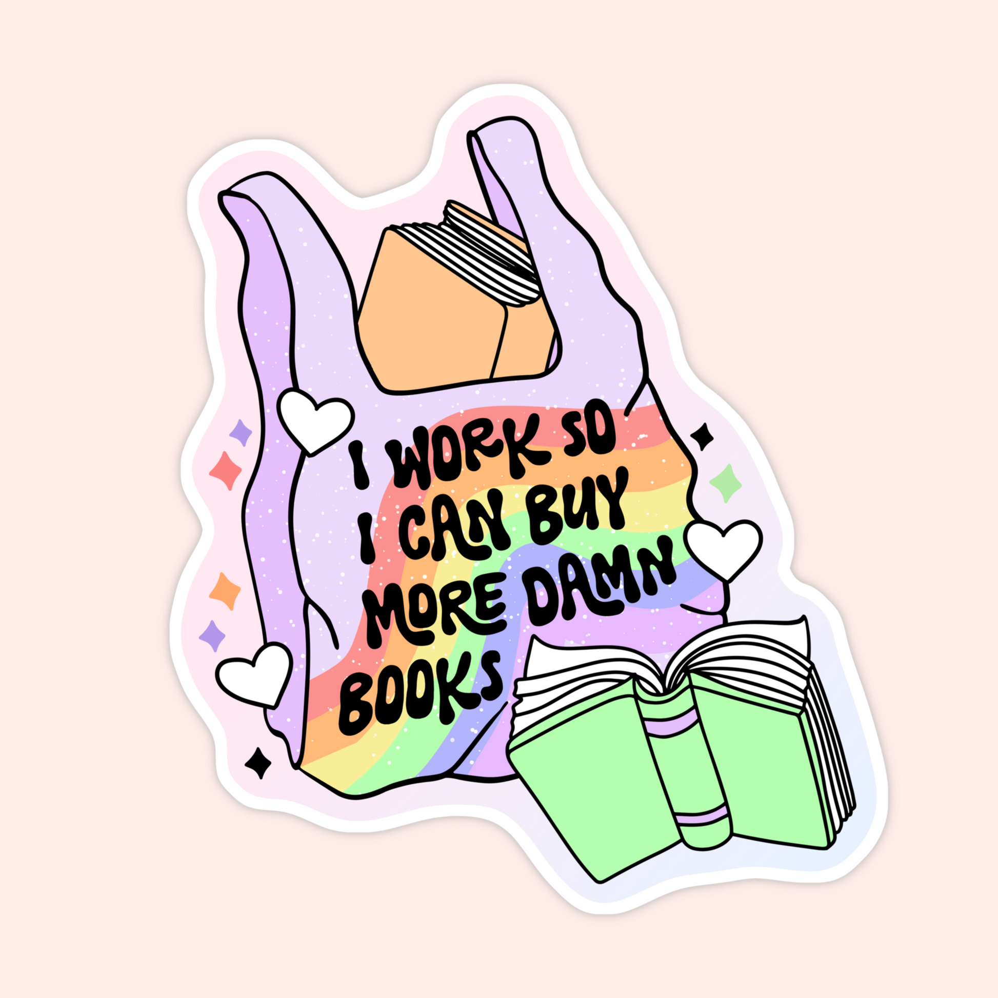 Lavender tote bag with rainbow detail and text that reads “I work so I can buy more damn books” with open book illustration.