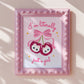 Pair of shiny red cherries with white kitten faces and a big pink bow, with the phrase “I’m literally just a girl.”
