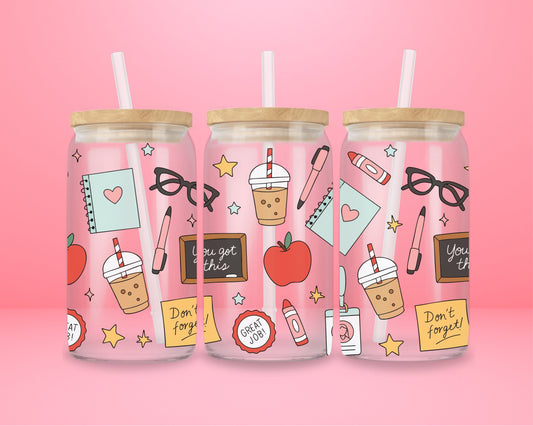 “Teacher-themed glass tumbler with apples, pencils, and stars – cute gift idea for educators.”