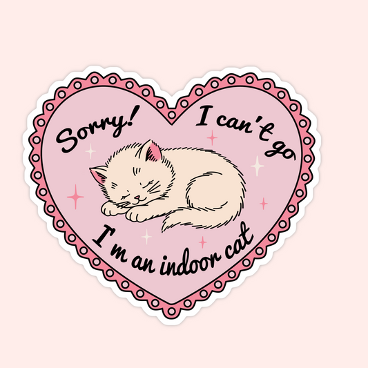 Pink heart-shaped sticker with a curled sleeping cat and text that says “Sorry! I can’t go, I’m an indoor cat.”