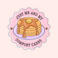 Pancake stack sticker with syrup and butter that says “Just me and my comfort carbs.”