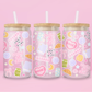 Pink girly glass can tumbler with books, croissants, bows, hearts, stars, and just a girl themed icons.