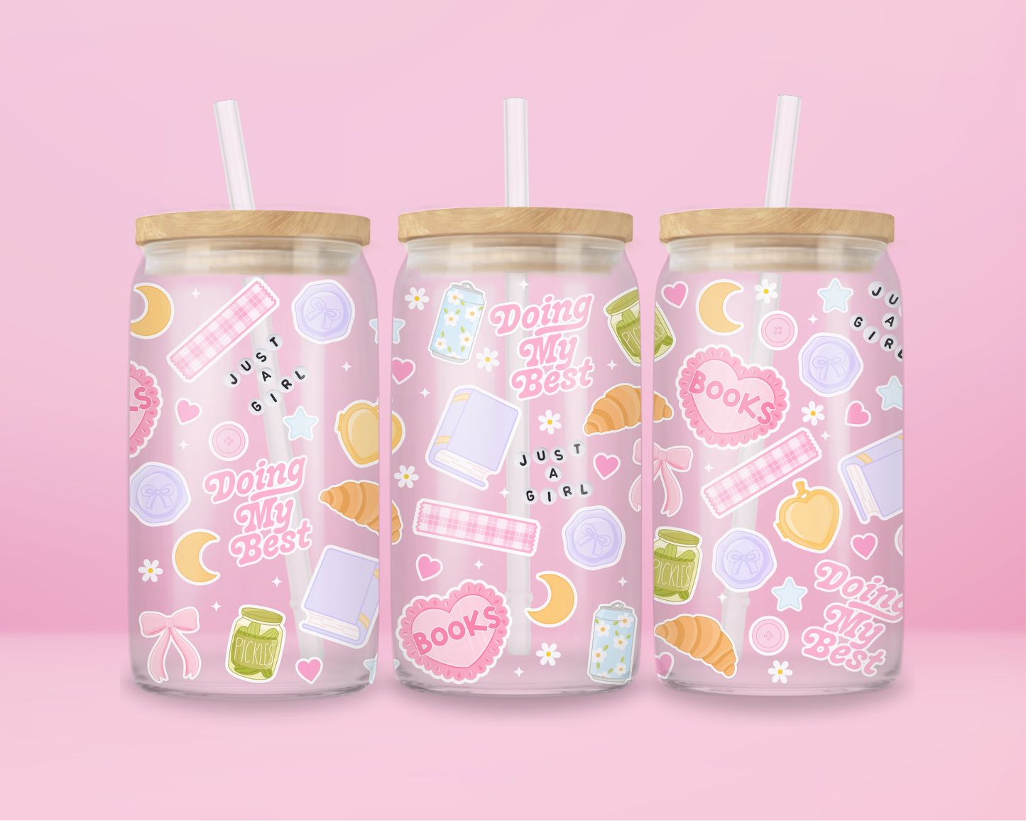 Pink girly glass can tumbler with books, croissants, bows, hearts, stars, and just a girl themed icons.