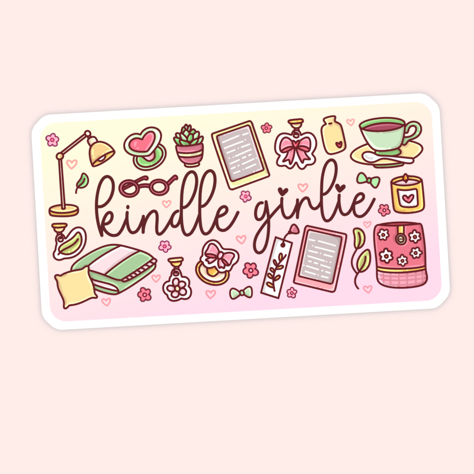 Cute Kindle girlie sticker with e-readers, cozy bed, pillow, lamp, tea cup, candle, bows, flowers, and bookish pink details.