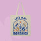 Beige canvas tote bag featuring retro-inspired mermaids, seashells, starfish, coral, fish, and the words Let’s Play Mermaids.