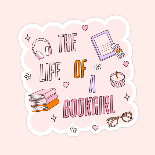 Pink sticker with the words “The Life of a Bookgirl” surrounded by books, headphones, a candle, glasses, and an e-reader.