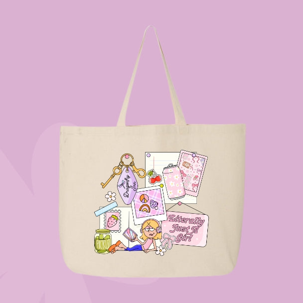 Beige tote bag with a collage design featuring girly items like a motel keychain, pickles, Polaroids, and text that says “Literally Just a Girl.”