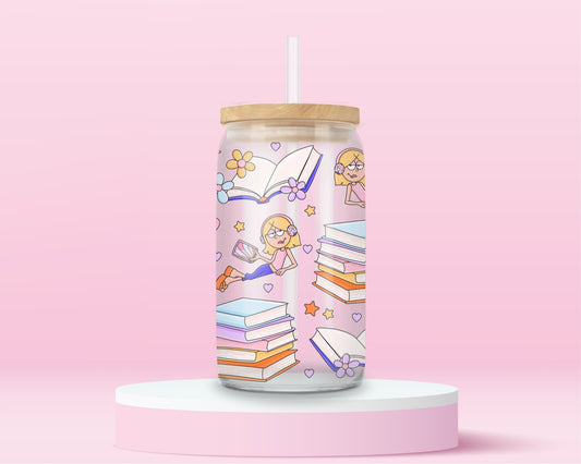 Pink glass tumbler with cartoon Lizzie McGuire reading, surrounded by stacks of pastel books, open pages, hearts, flowers, and stars — perfect for your inner Y2K bookworm.