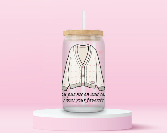 Glass tumbler featuring pink cardigan illustration inspired by Taylor Swift Lover era aesthetic.