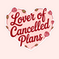 Pink heart-shaped vinyl sticker with floral details and the phrase “Lover of Cancelled Plans.”